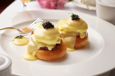 locally farmed Eggs Benedict on house-made brioche with heritage Berkshire ham and caviar