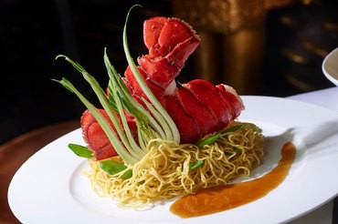 decadent noodles served with fresh Maine lobster tail