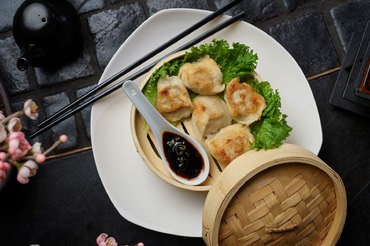 Traditional food, dumplings manta with soy sauce