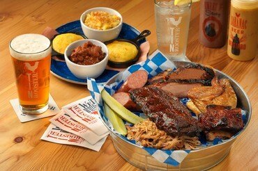 Tin Rooster dinner platter with beer