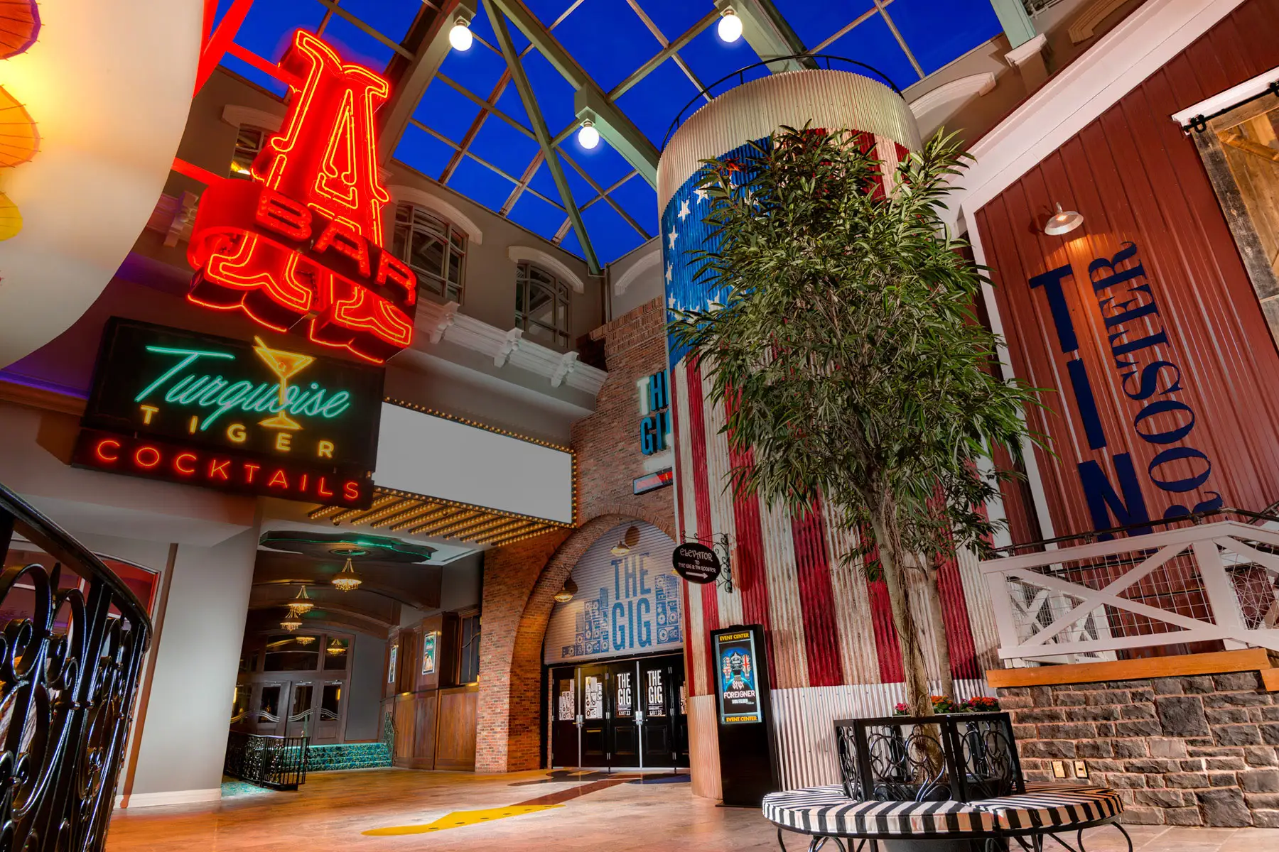 Venues at Exit 33 including Atrium Bar, Turquoise Tiger, and Tin Rooster