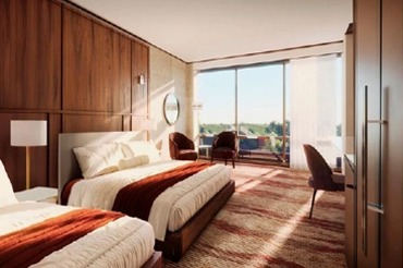 Digital rendering of a Deluxe Room with Two Queen Beds