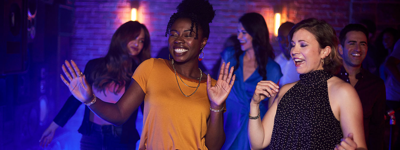 Friends dancing at a nightclub