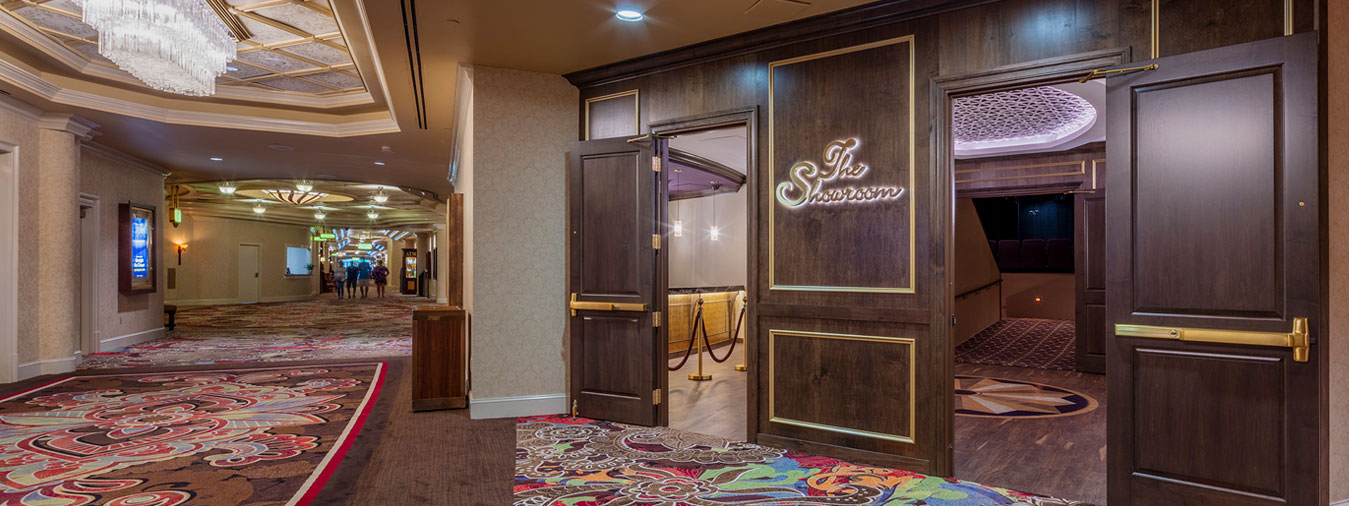 Ornate wood and gold doors to enter The Showroom are open