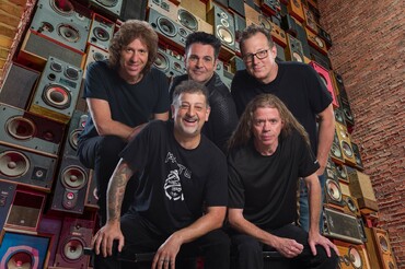 Under the Paige band photo with Gig background