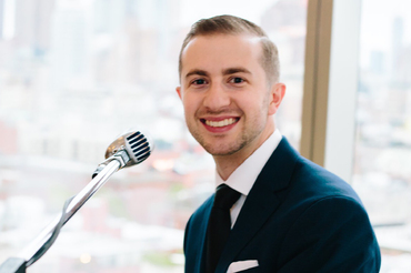 Steve Laureti headshot at microphone
