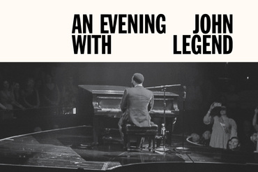 John Legend playing piano